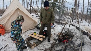 Winter camping in the Borealis forest, Northern Alberta.