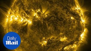 NASA release Thermonuclear Art a stunning look at the sun - Daily Mail