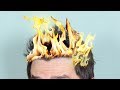 HAIR CATCHES ON FIRE!