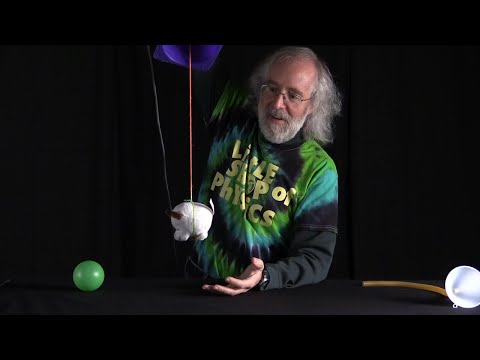 When trying to blow a ping pong ball out of a funnel the low pressure that holds the ball in the funnel even against gravity occurs?