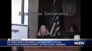 Victim's family members charged after courtroom brawl