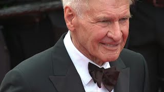 Harrison Ford monte les marches du Festival pour "Indiana Jones 5" | AFP Images