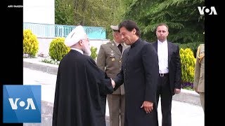 Iran President welcomes Pakistan PM Khan with honor guard