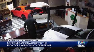 Thieves run car into dealership in attempt to steal car