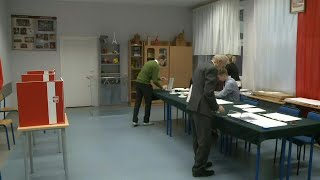 Polls open in deeply divided Poland | AFP