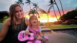 Adley plays Disney Princess songs with her new Pink Guitar in hawaii  (family beach day)