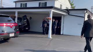 Pallbearers taking papa to the car