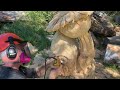 How to chainsaw carve a gnome and flower