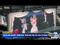 Travis Kelce joins Taylor Swift onstage at London show