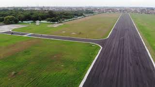 Iterative Learning based Biplane-Quadrotor Transition