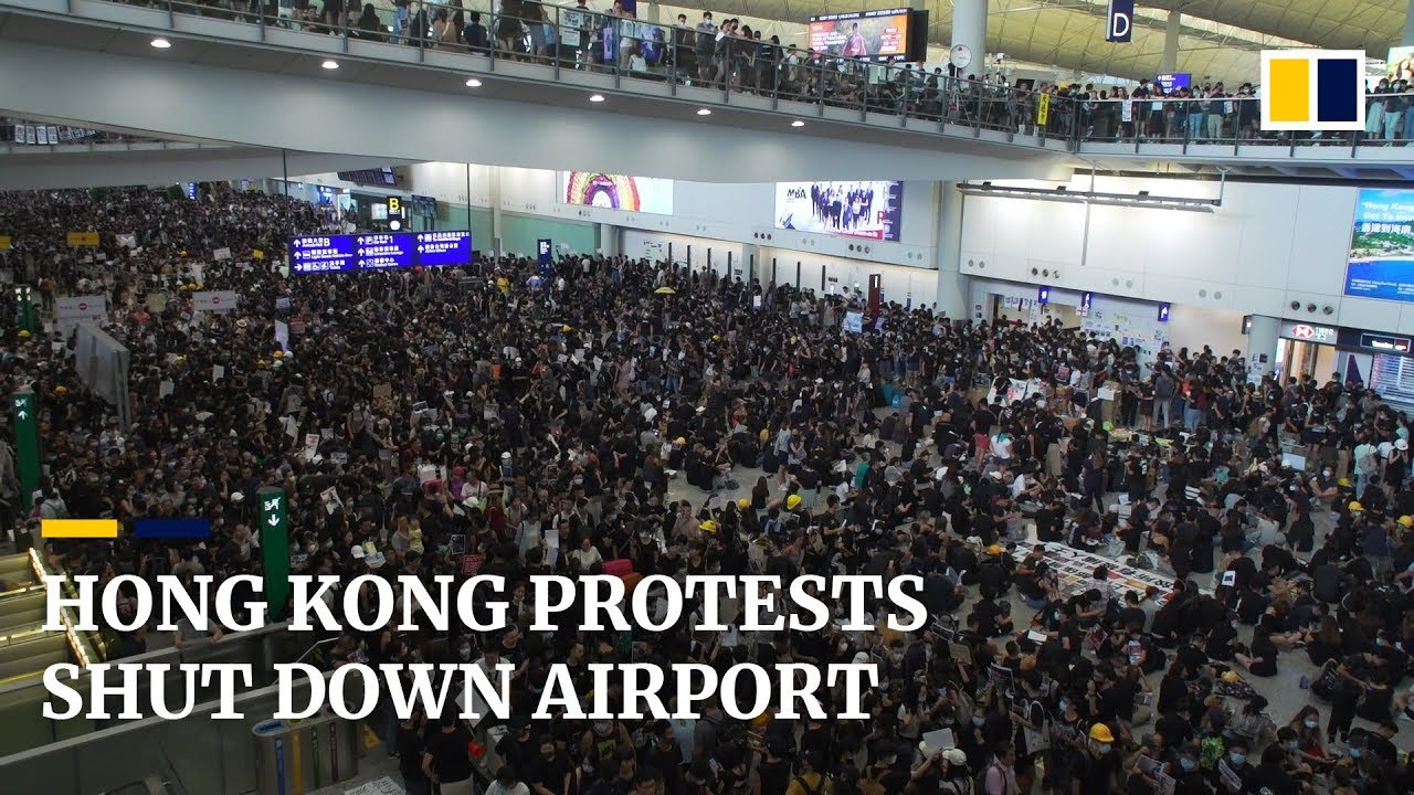 Hong Kong Protests Shut Down Airport - YouTube