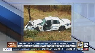 Head on collision leaves Carroll County sheriff's deputy injured