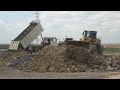 Great SWAMP Landfill New Modern Wheel Loader Bulldozer Spreading Gravel Rock Soil Skill Operator