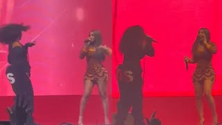 SZA and Cardi B performing together on the stage
