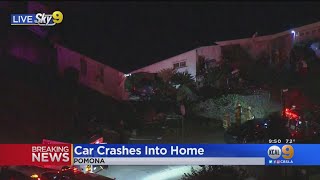 Car Crashes Into Pomona Home, 1 Person Trapped