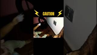 Caution Baby Trying To Insert Plug Into The Socket Danger Electric Shock