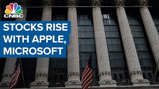 Stocks extend gains as Apple and Microsoft send Nasdaq to record high