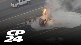 Vehicle flipped over and caught fire after crash