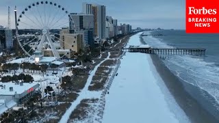 Drone Footage Captures Snow Blanketing Myrtle Beach, South Carolina, Following Powerful Winter Storm