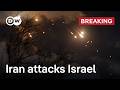 Israeli media reports over 100 launched missiles from Iran | DW News