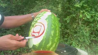 Carving roses on water melon