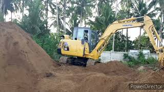 Komatsu PC56 moving stockpile