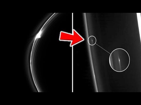 NASA Has Discovered Mystery Objects Orbiting Saturn's Ring - YouTube