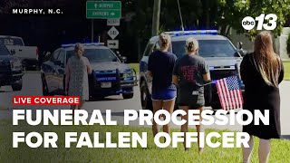 Funeral procession for detention officer killed in line of duty
