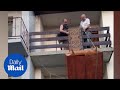 Movers Accidentally Drop Wardrobe off Balcony