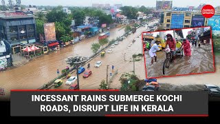 നിർത്താതെ പെയ്യുന്ന മഴയിൽ കൊച്ചിയിലെ റോഡുകൾ മുങ്ങി, കേരളത്തിലെ ജനജീവിതം താറുമാറായി