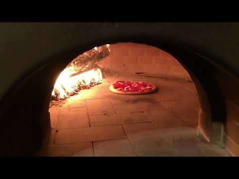 Pizza in the Wood Fired Oven Pizza in the Wood Fired Oven