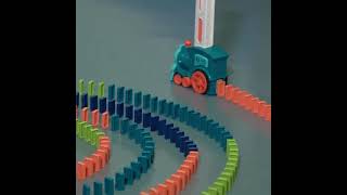 Domino Train Builds Their Own Train Track