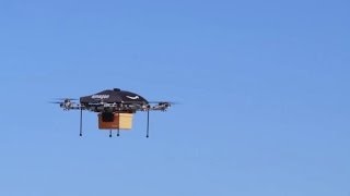 Amazon unveils futuristic mini-drone delivery plan