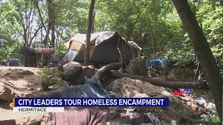 City leaders tour Nashville homeless encampment