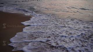 Slow motion photographer amateur shooting sea foam.