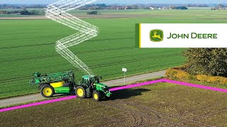 Pulverizador arrastrado R900 con el 6R de John Deere