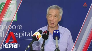 Singapore PM Lee Hsien Loong speaks to reporters after receiving COVID-19 vaccine