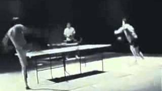Bruce Lee plays ping-pong with Nun-Chucks