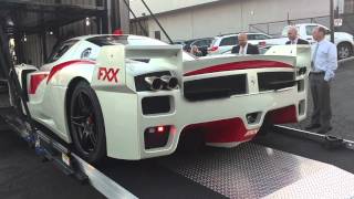 Ferrari FXX getting loaded onto a transporter.