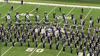 The University of Michigan marching band performs with the Ohio State Marching Band