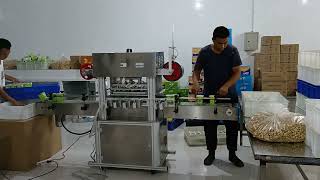 Biscuit Packing Machine One or four biscuit bucket sealing machine