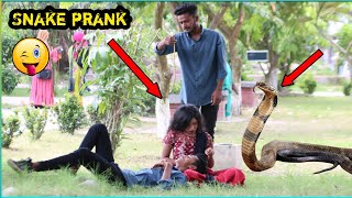 Fake snake prank video 🐍 king cobra snake prank on public !!  viral snake prank video on cute girls