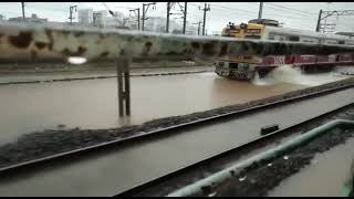 Mumbai local Train run in heavy rain