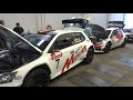 Rally cars in Staden - technical inspection and a walk through the service area (raw footage)