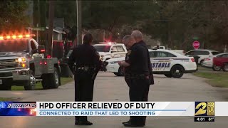 HPD officer relieved of duty connected to raid that led to shooting