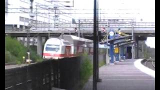 IC2 train passes Käpylä station