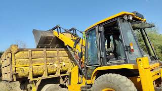 3DX Breaker with Bucket Loading to New Truck for New Apartment Underground day night Work