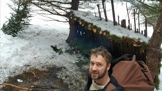 I Built A Cozy Bushcraft Shelter and Survived 24 Hours In Extreme Winter Conditions