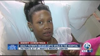 Adult patients receive gifts while in the hospital