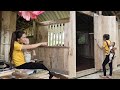 Single mother builds entire house with wooden walls, complete windows and main door